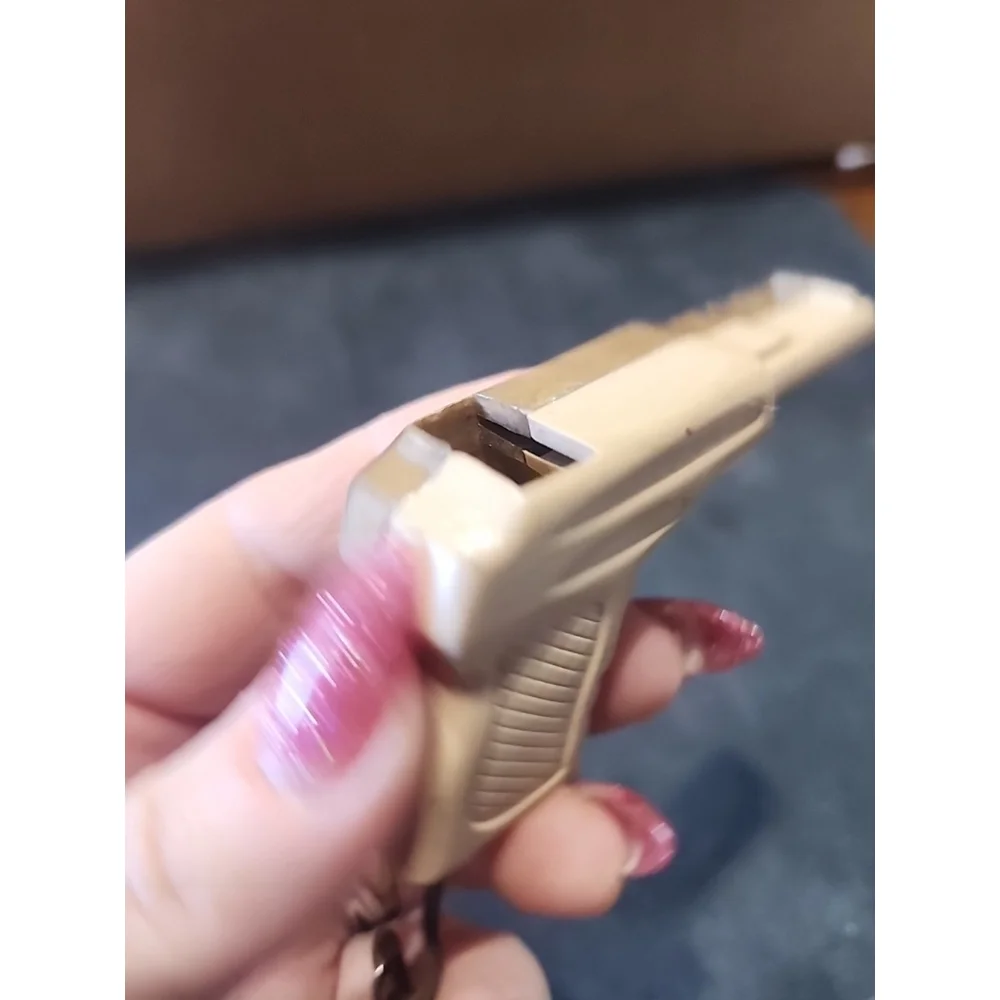 VINTAGE PISTOL SHAPE PLASTIC WHISTLE (MADE IN USA PAT PEND)